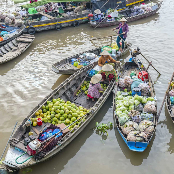 The Mighty Mekong Delta: Vietnam’s Floating Markets and Historic River Villages